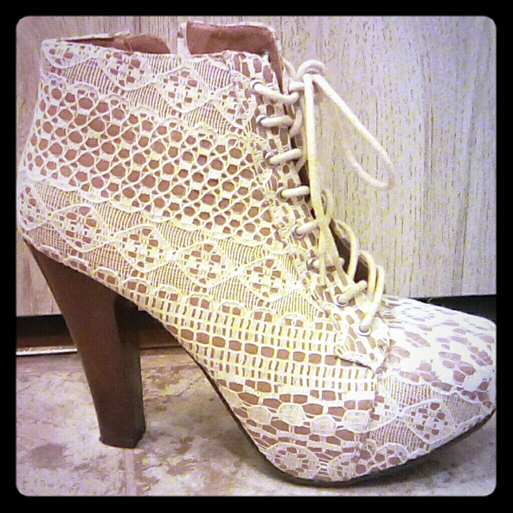 Lace covered heel boot, worn once